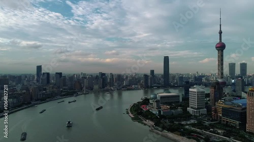 Aerial drone view of Shanghai city center in China,Asia. Huangpu River in Shanghai frome drone. Huangpu River, Huangxiepu or Chunshen River the landmark of Shanghai, Pudong and Puxi. photo