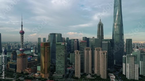 Aerial drone view of Shanghai city center in China,Asia. Huangpu River in Shanghai frome drone. Huangpu River, Huangxiepu or Chunshen River the landmark of Shanghai, Pudong and Puxi. photo