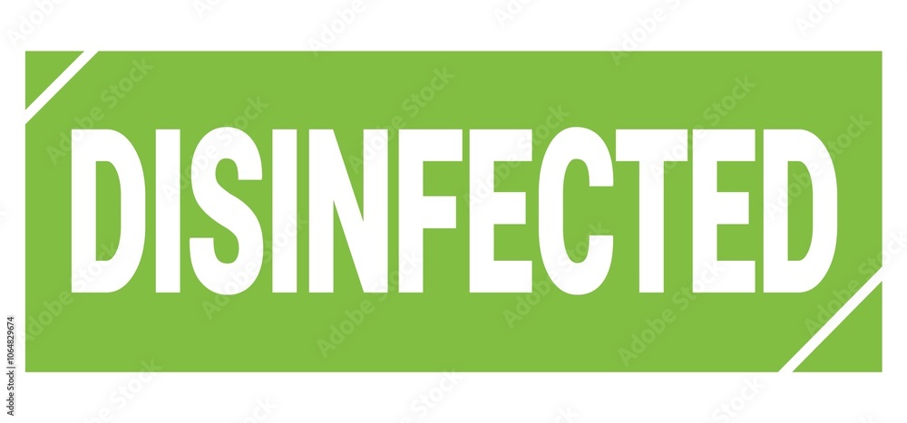 DISINFECTED text written on green stamp sign. DISINFECTED text written on green stamp sign.