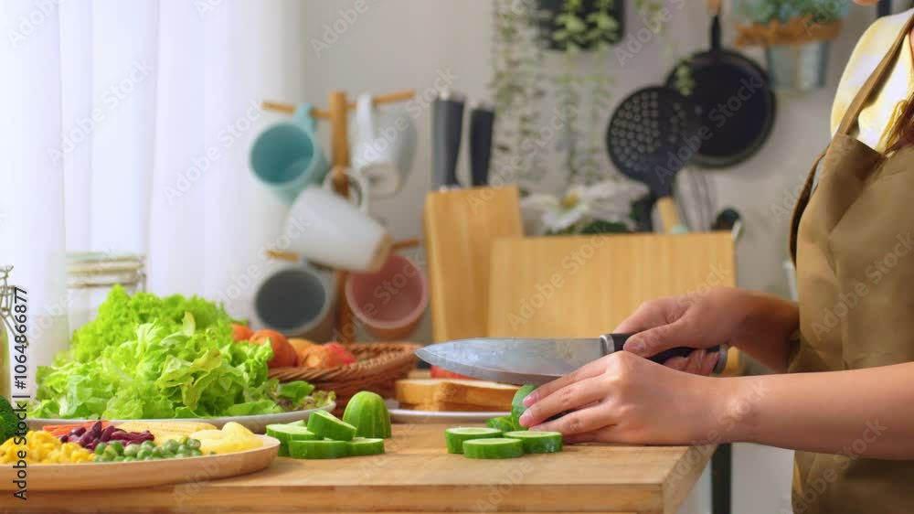 Close up of woman cooking healthy foods in kitchen in morning at home. Close up of woman cooking healthy foods in kitchen in morning at home.