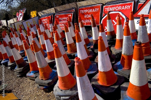 Traffic cones and road signs in storage ready for distribution.