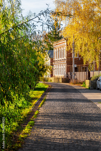 Bogorodsk, Nizhny Novgorod region, Russia, Street view of an ancient provincial Russian city on the shore of a lake on a summer evening. An ancient building of artisans, an architectural monument. photo