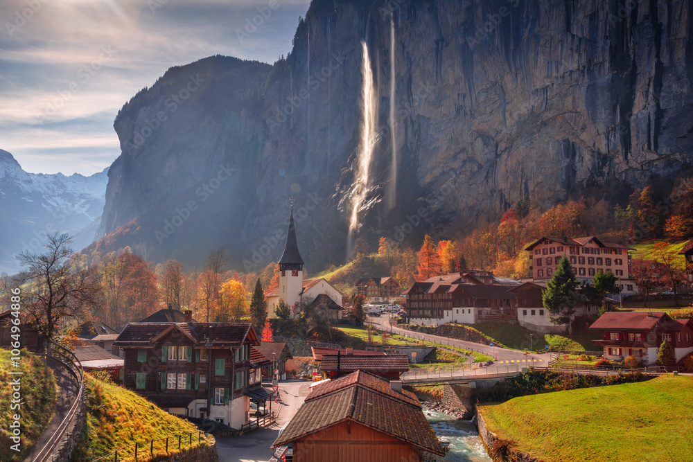 Lauterbrunnen, Switzerland. Landscape image of iconic village Lauterbrunnen, located in Swiss Alps, Switzerland at beautiful autumn sunrise.
