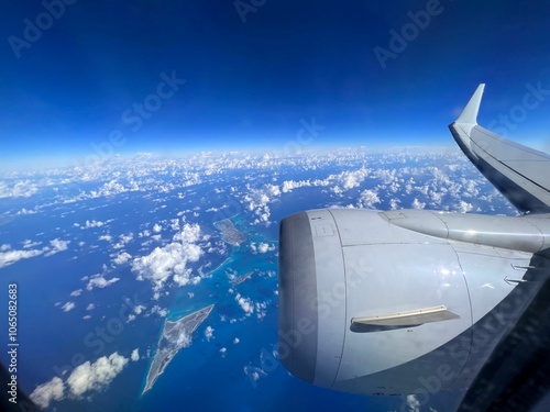 Airplane view over tropical islands and ocean. photo