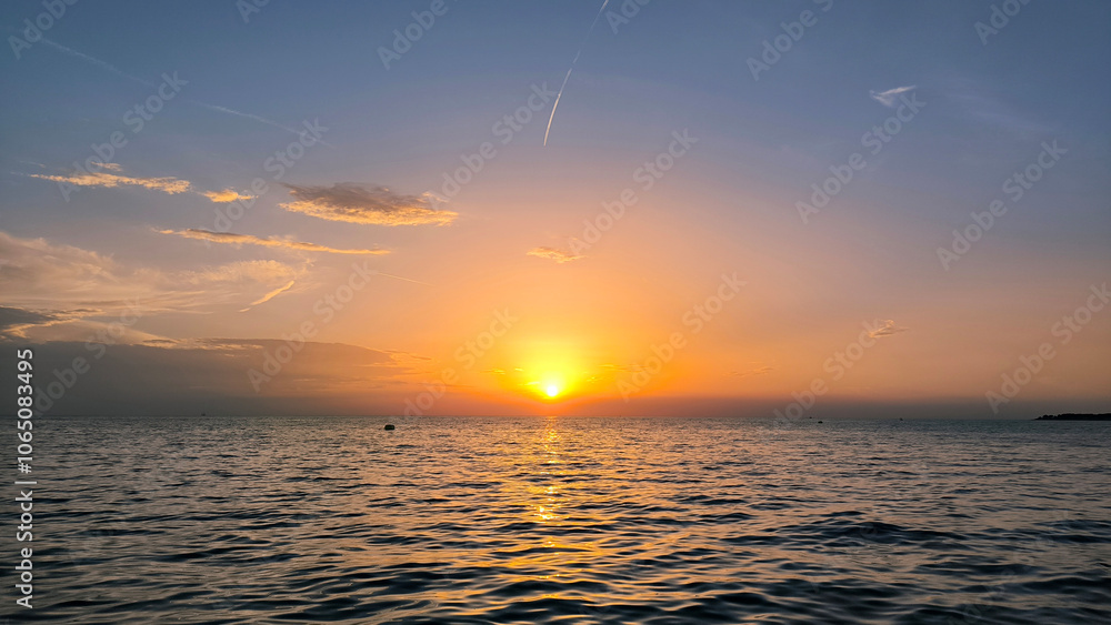 Fototapeta premium sunset by the Adriatic Sea in Poreč, Croatia