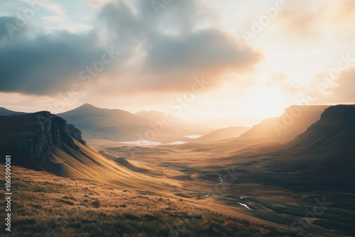 A picturesque valley in the highlands is enveloped in the soft golden light of a new day, highlighting the rolling hills and tranquil nature of this remote area.