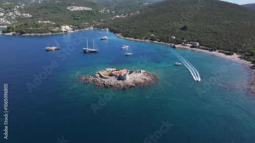 Aerial view of of Otocic Gospa island with an Orthodox church, Kotor Bay, Montenegro photo