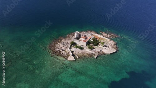 Aerial view of of Otocic Gospa island with an Orthodox church, Kotor Bay, Montenegro