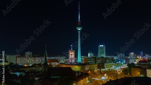 BERLIN, GERMANY - OCTOBER 28, 2024: Evening skyline view of Berlin with iconic TV tower lit up and vibrant city lights