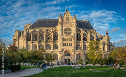 Paris, France - 10 28 2024: View of Church of Saint-Eustache from Nelson Mandela Garden at sunset.