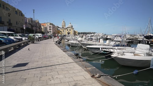 View of Church of Madonna delle Grazie and boats in Marina Grande on a sunny day, Procida, Phlegraean Islands, Gulf of Naples, Campania, Southern Italy, Italy photo