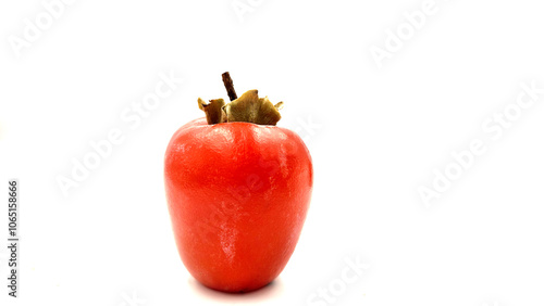 Kaki persimmon (Diospyros kaki) as a delicious fruit of autumn, isolated on white background.