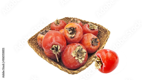 Kaki persimmon (Diospyros kaki) as a delicious fruit of autumn, isolated on white background.