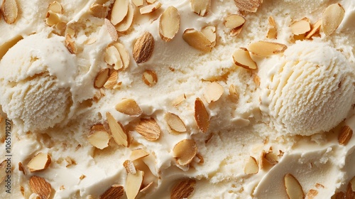 56. Close-up of toasted almond ice cream with almond flakes on top, highlighting the rich texture