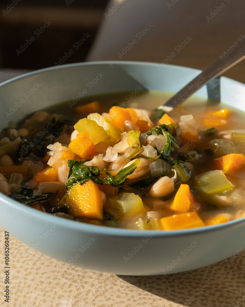 Delicious Italian White Bean Soup in a Blue Bowl – Close-Up Delicious Italian White Bean Soup in a Blue Bowl – Close-Up