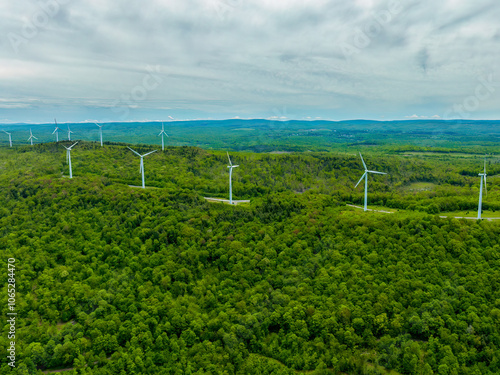 Obraz na płótnie Aerial View of Wind Turbines Across Verdant Hills w salonie