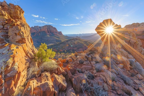 Sunbeams Shining Through a Gap in Red Rock Formations photo