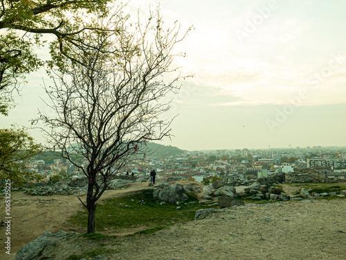 Ancient Roman theater of Philippopolis. It was built during the time of the Roman emperor Marcus Ulpius Trajan. Plovdiv, Bulgaria.Beautiful autumn view of the residential area of ​​Plovdiv, Bulgaria,  photo