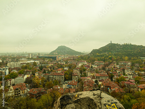 Ancient Roman theater of Philippopolis. It was built during the time of the Roman emperor Marcus Ulpius Trajan. Plovdiv, Bulgaria.Beautiful autumn view of the residential area of ​​Plovdiv, Bulgaria,  photo