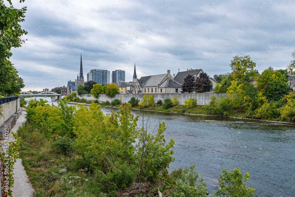 Autumn Cityscape with churches along the Grand River in Cambridge, Galt, Ontario, Canada Autumn Cityscape with churches along the Grand River in Cambridge, Galt, Ontario, Canada