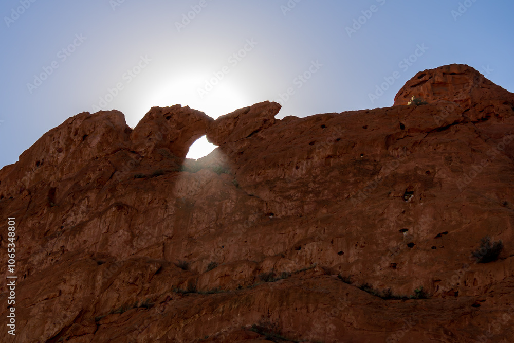 Peek-a-Boo Sun Through Colorado's Rock Arch: Nature's Wink