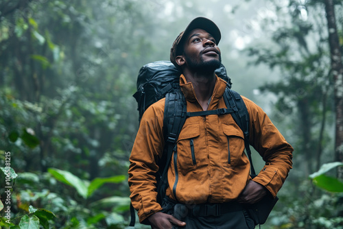 Wallpaper Mural Afro male forest ranger patrolling at foggy forest for conservation Torontodigital.ca