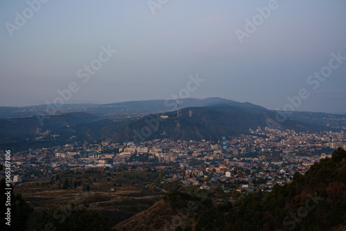 Tbilisi, Georgia - October 20 2024: Cityscape of Tbilisi under Mount Mtatsminda photo