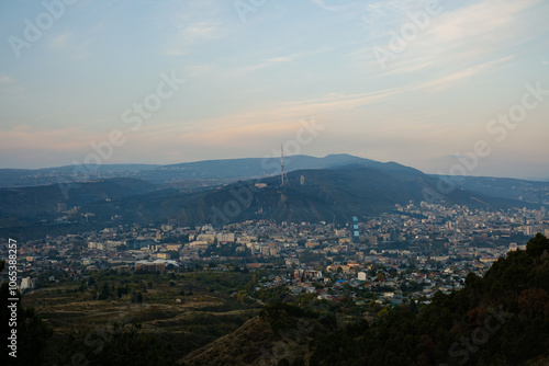 Tbilisi, Georgia - October 20 2024: Cityscape of Tbilisi under Mount Mtatsminda photo