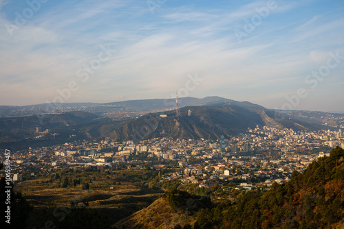 Tbilisi, Georgia - October 20 2024: Cityscape of Tbilisi under Mount Mtatsminda photo