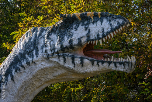 Detail of a plastic carnivorous dinosaur head.
 photo