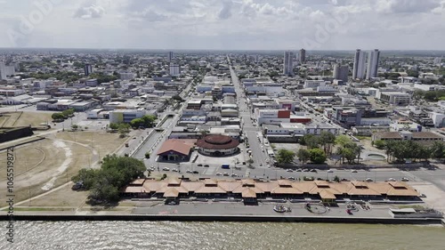 Drone flies from Amazon River at high tide over Orla da Macapá and Amapaense Artisan House in Macapá, Amapá, Brazil photo