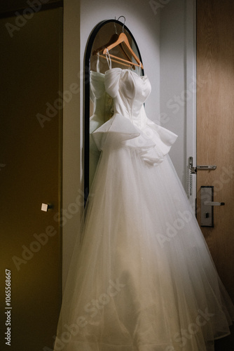 Wedding dresses for the bride and groom in the dressing room