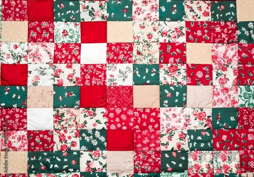 Patchwork Quilt with Red and Green Floral Pattern photo