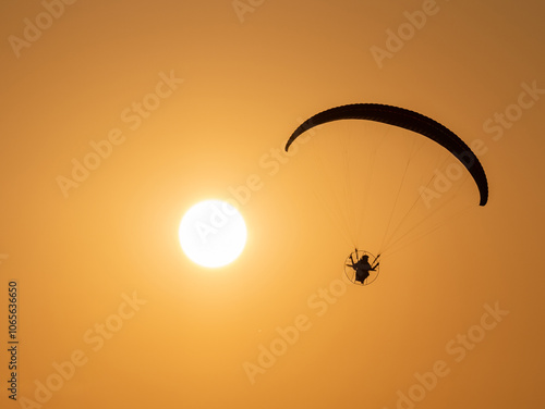 Paramotor with golden evening light