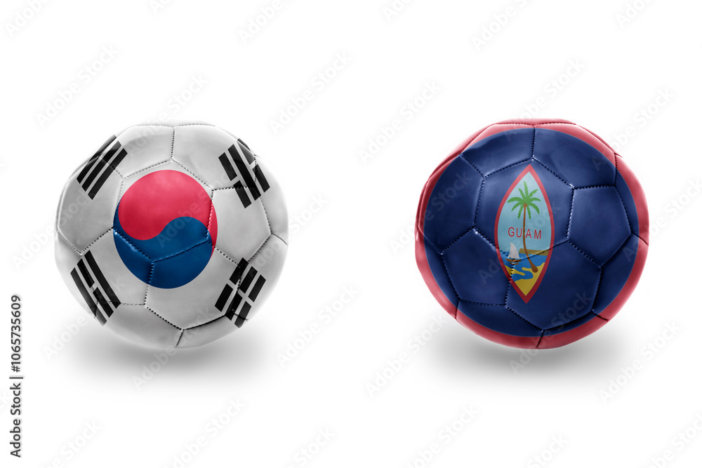 Obraz premium football balls with national flags of guam and south korea ,soccer teams. on the white background.