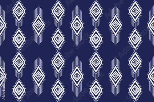 Seamless ikat embroidery pattern in brown, white geometric shapes. Blue background, illustration, vector, design.