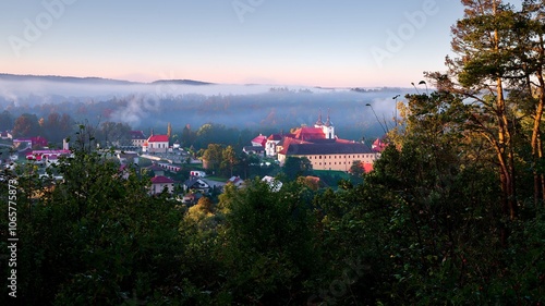 Autumn morning above Zeliv, rising sun, monastery photo