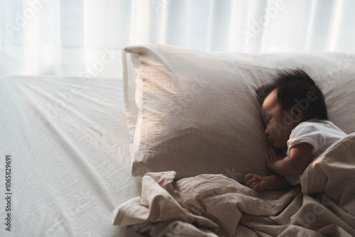 Peaceful Baby Sleeping on Pillow in Soft Morning Light