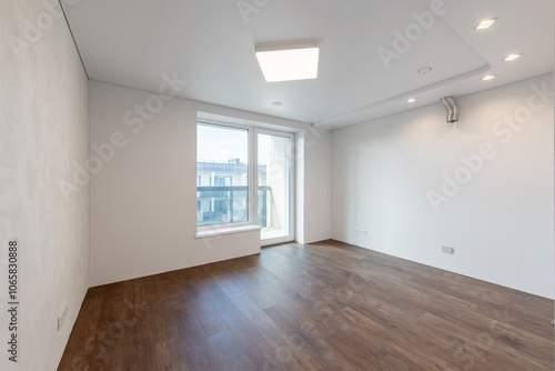 Empty Home Kitchen Interior. White Walls Room Corner and Windows. Interior Empty Room with White Walls and Wooden Floor.
