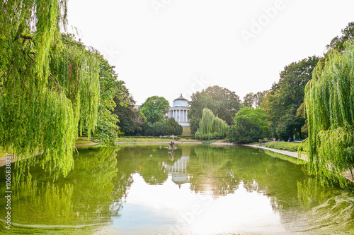 Saxon Garden Ornamental Lake with View of the Temple Of Vesta Water Tower in Summer of the Polish capital Warsaw, Poland photo