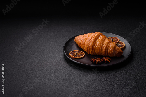 Golden crispy croissant with a sweet creamy fruit filling