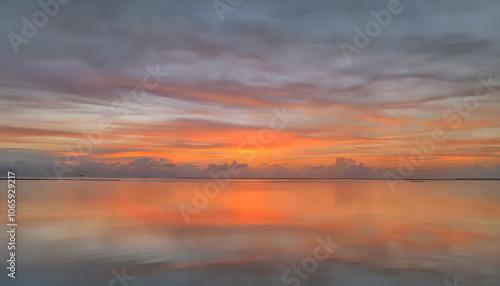 Tranquil Sunset over the Majuro Lagoon with Orange and Purple Skies photo