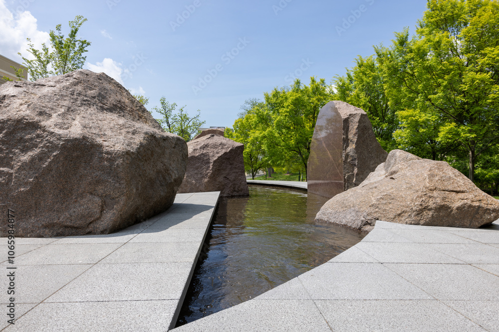 Contemporary Rock Garden with Water Feature and Granite Boulders.