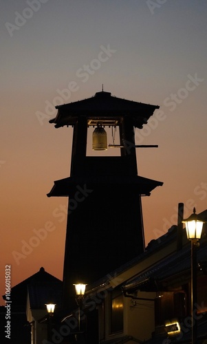 silhouette of a bell tower at sunrise in Kamakura, Japan