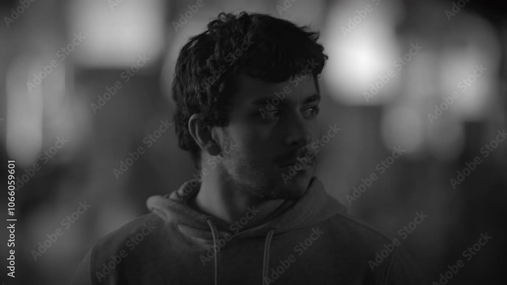 A Contemplative Young Man Positioned in a Lively Urban Setting, Evoking Deep Thoughts A Contemplative Young Man Positioned in a Lively Urban Setting, Evoking Deep Thoughts