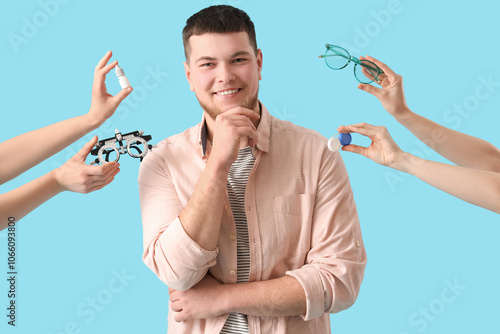 Young man and hands with it...