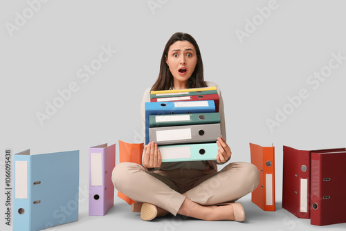 Shocked young businesswoman...