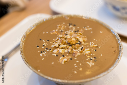 Delicious walnut paste served in a bowl photo