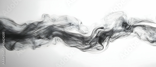 Stylized black smoke wave on white isolated background, creating a dramatic and artistic visual effect.