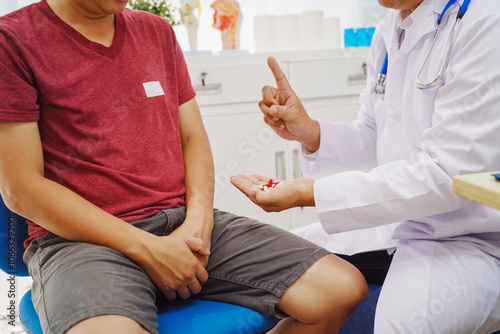 A man consults a doctor in a hospital for a male urinary tract infection. The doctor advises on symptoms like frequent urination, pain, and possible causes, including infections and prostate issues